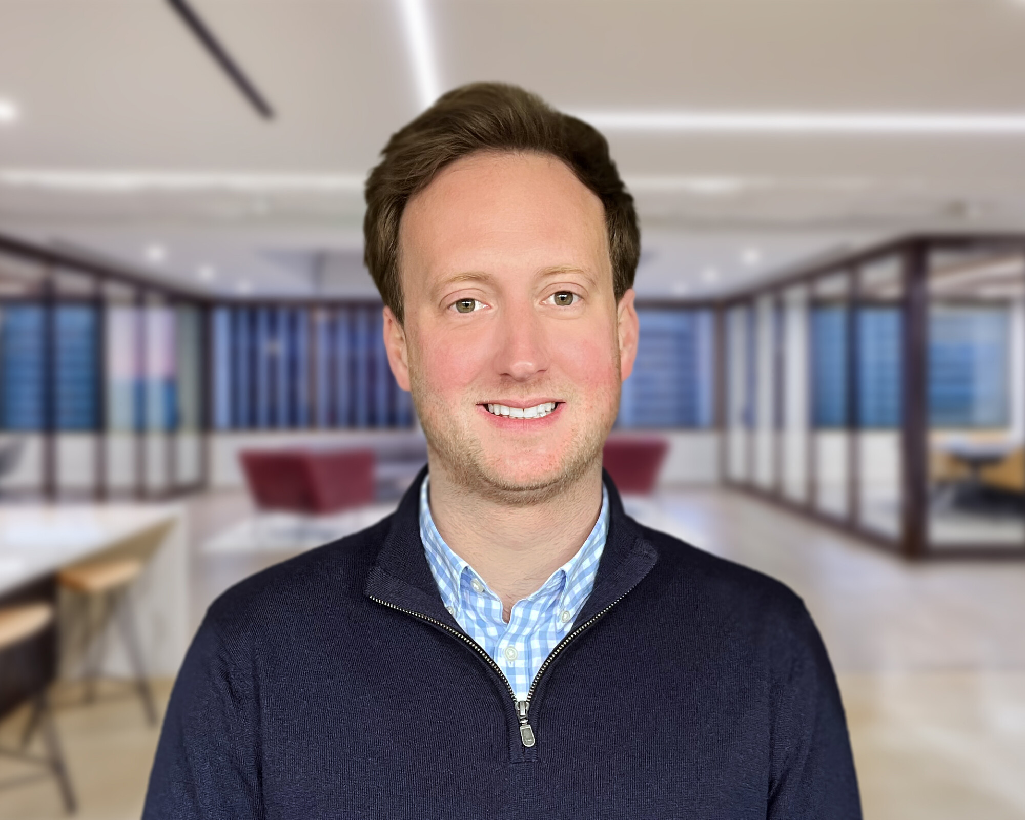 uk-tax-partner-standing-in-office