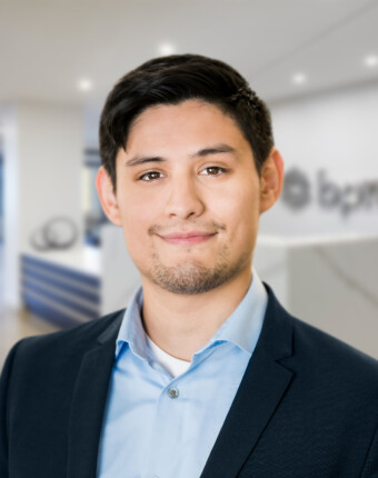 man-in-suit-standing-in-office