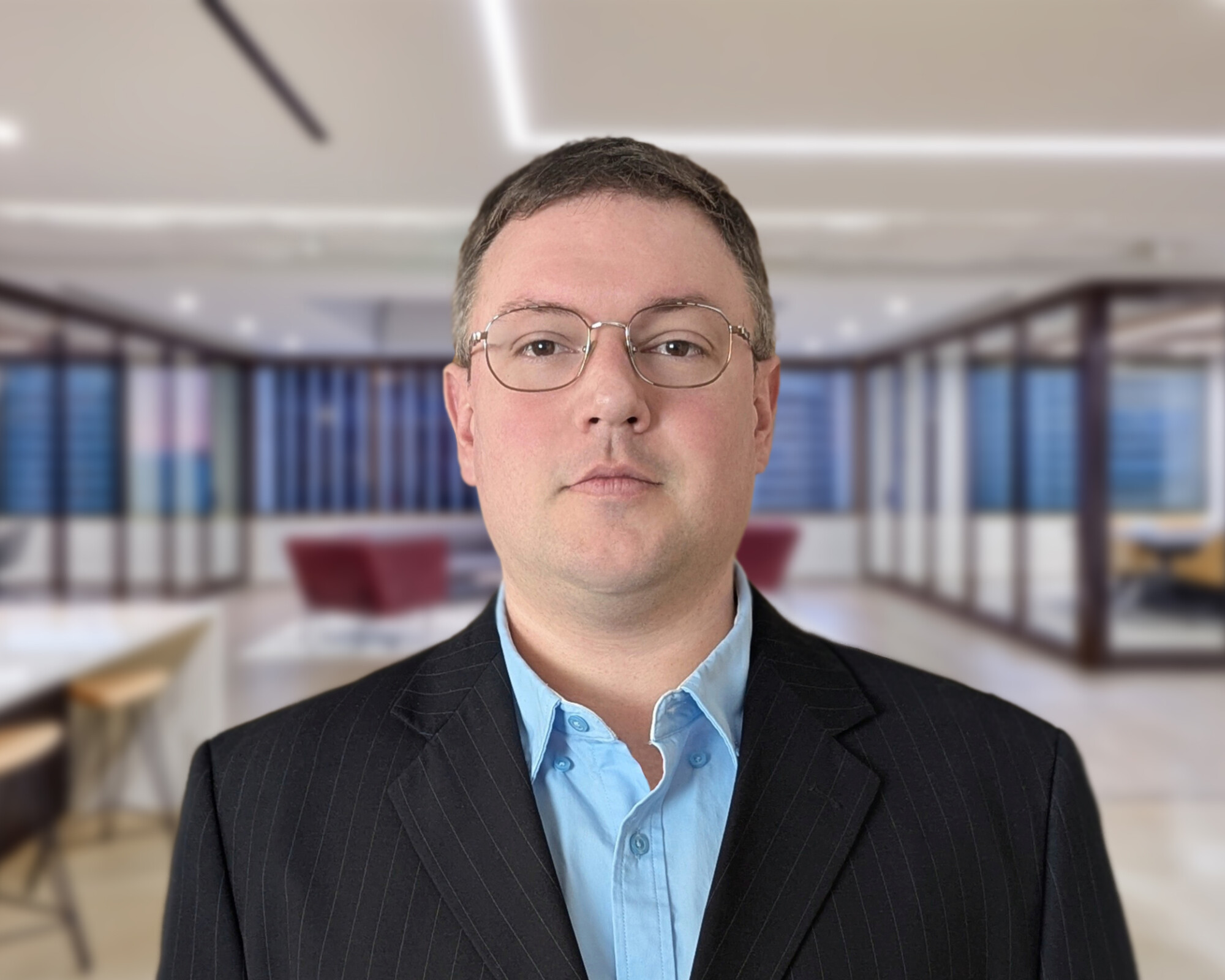 Senior Penetration Tester standing in San Francisco office.