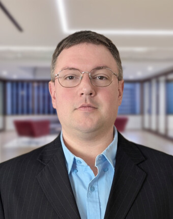 Senior Penetration Tester standing in San Francisco office.