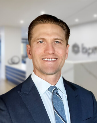 sacramento-audit-professional-standing-in-office